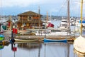 Small sailboats and rowboats near the Wooden Boats museum. Royalty Free Stock Photo